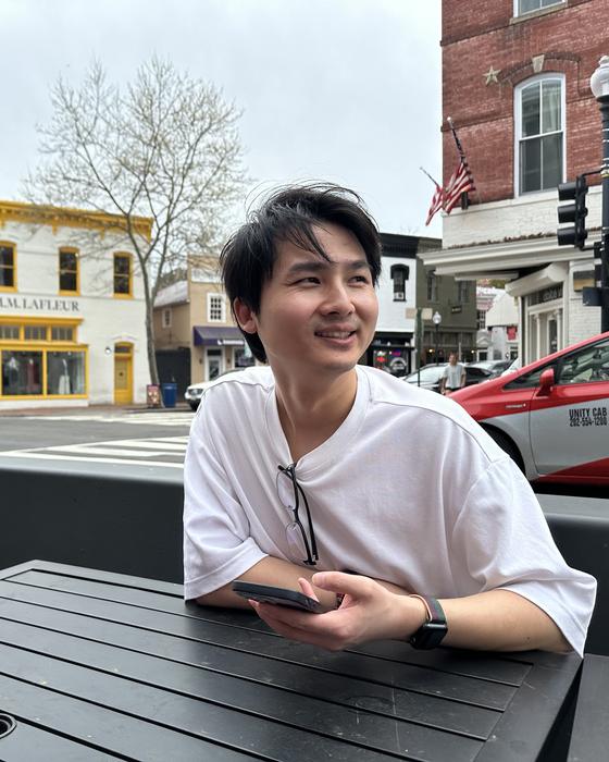 Peng Wu at an outdoor café